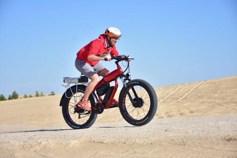 a man using an electric bike in desert